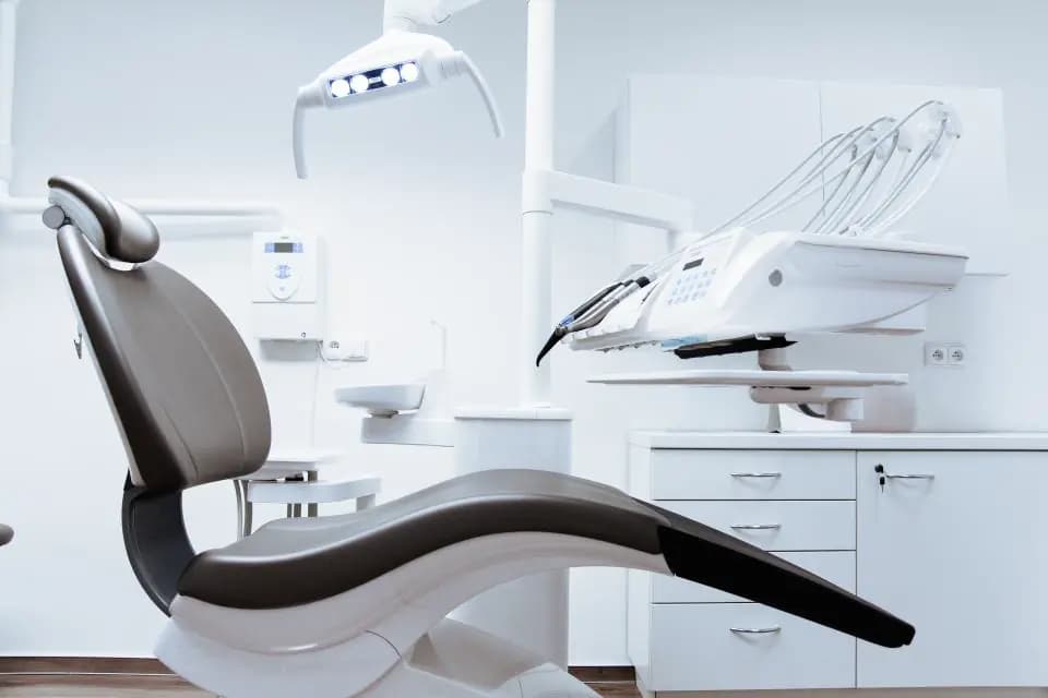 A modern dental chair in a clean clinic